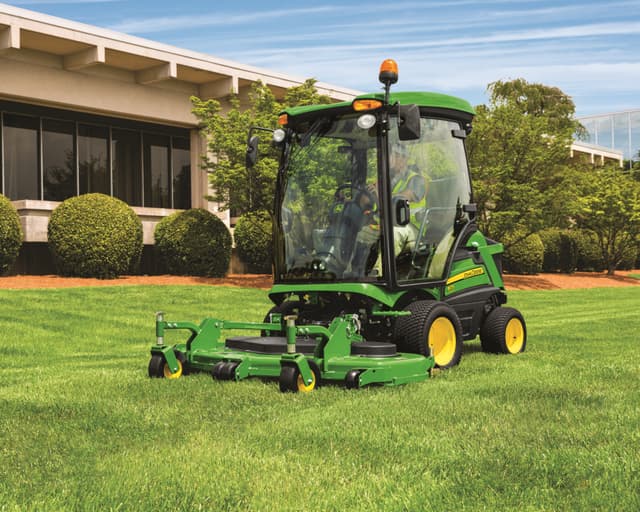 A workers used a John Deere 1575 mower to maintain a commercial property in the Bay area.