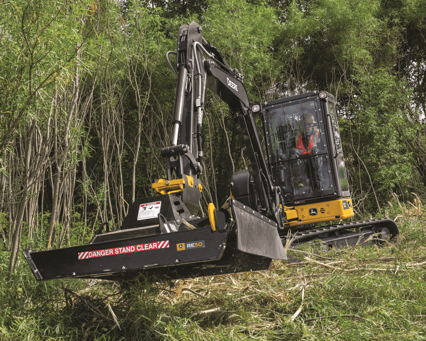 A compact excavator takes care of work on a job site in California.