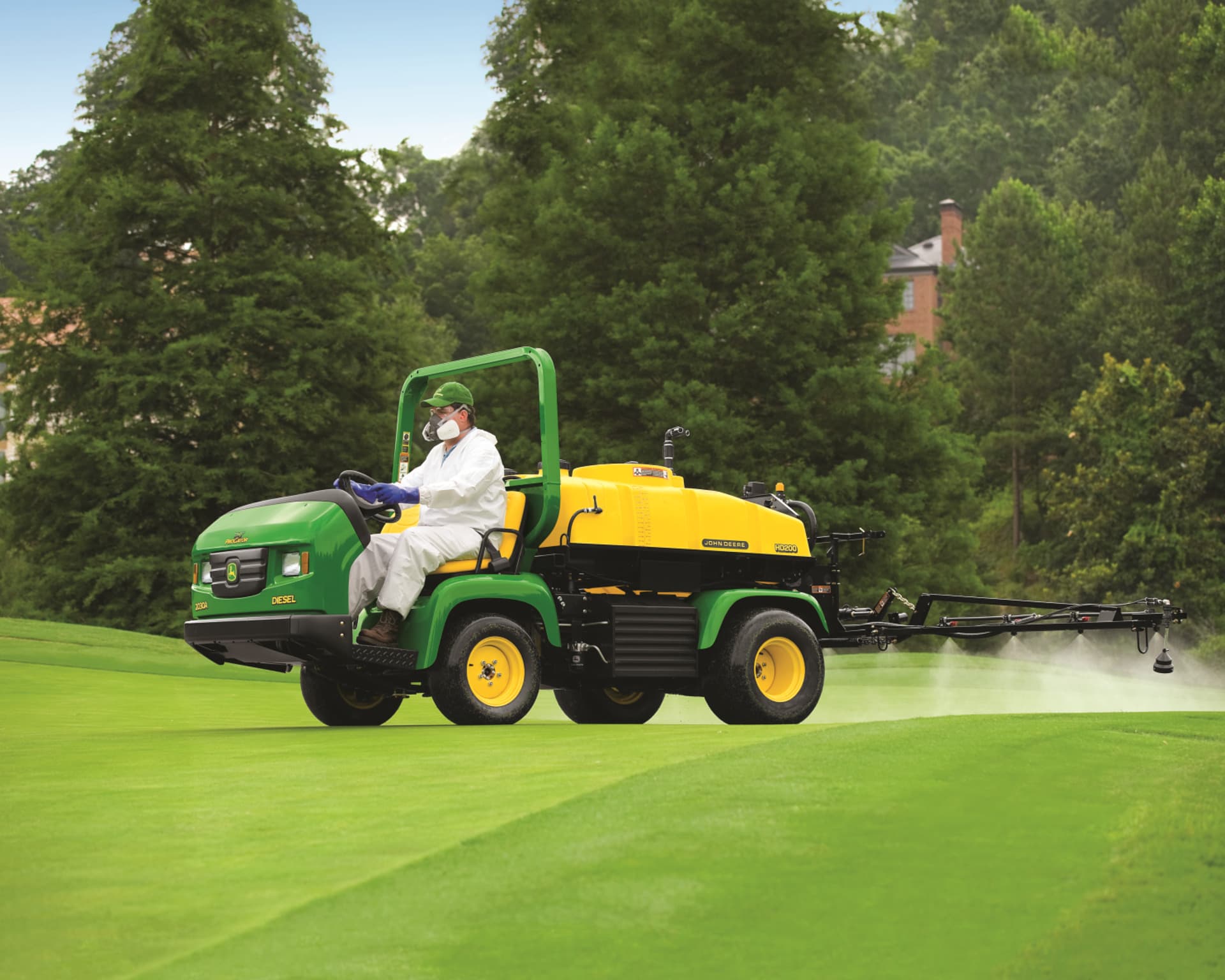 A John Deere golf cart with sprayer treats a golf course in California.