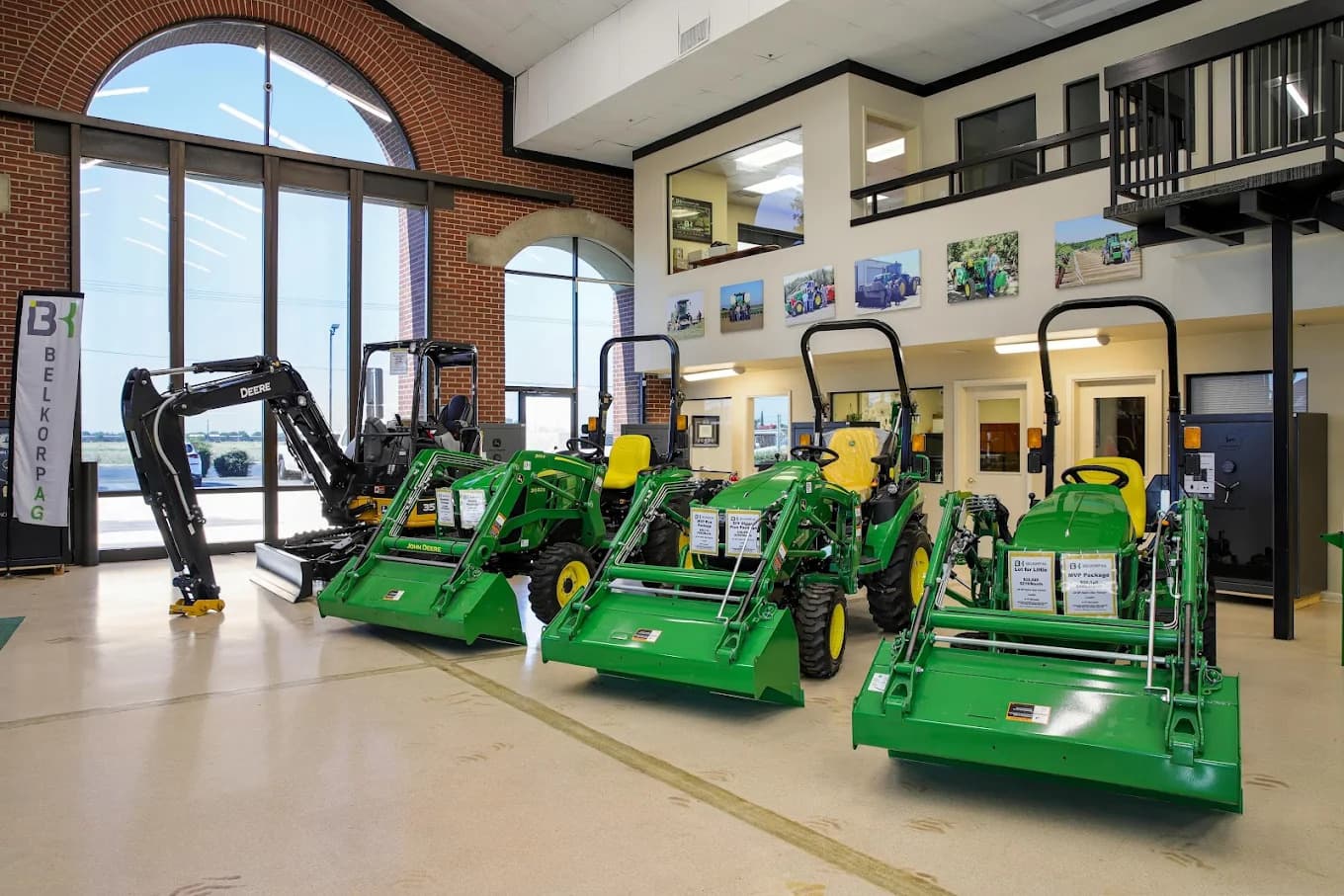 Tractors and other machinery sit inside a Belkorp Ag dealership in Modesto, California.